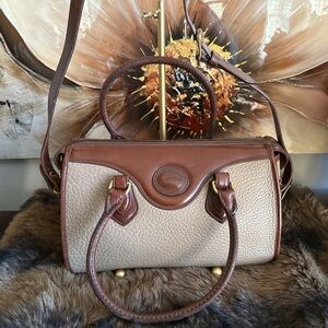 Dooney & Bourke Cream and Brown hand and crossbody. Preloved and vintage.